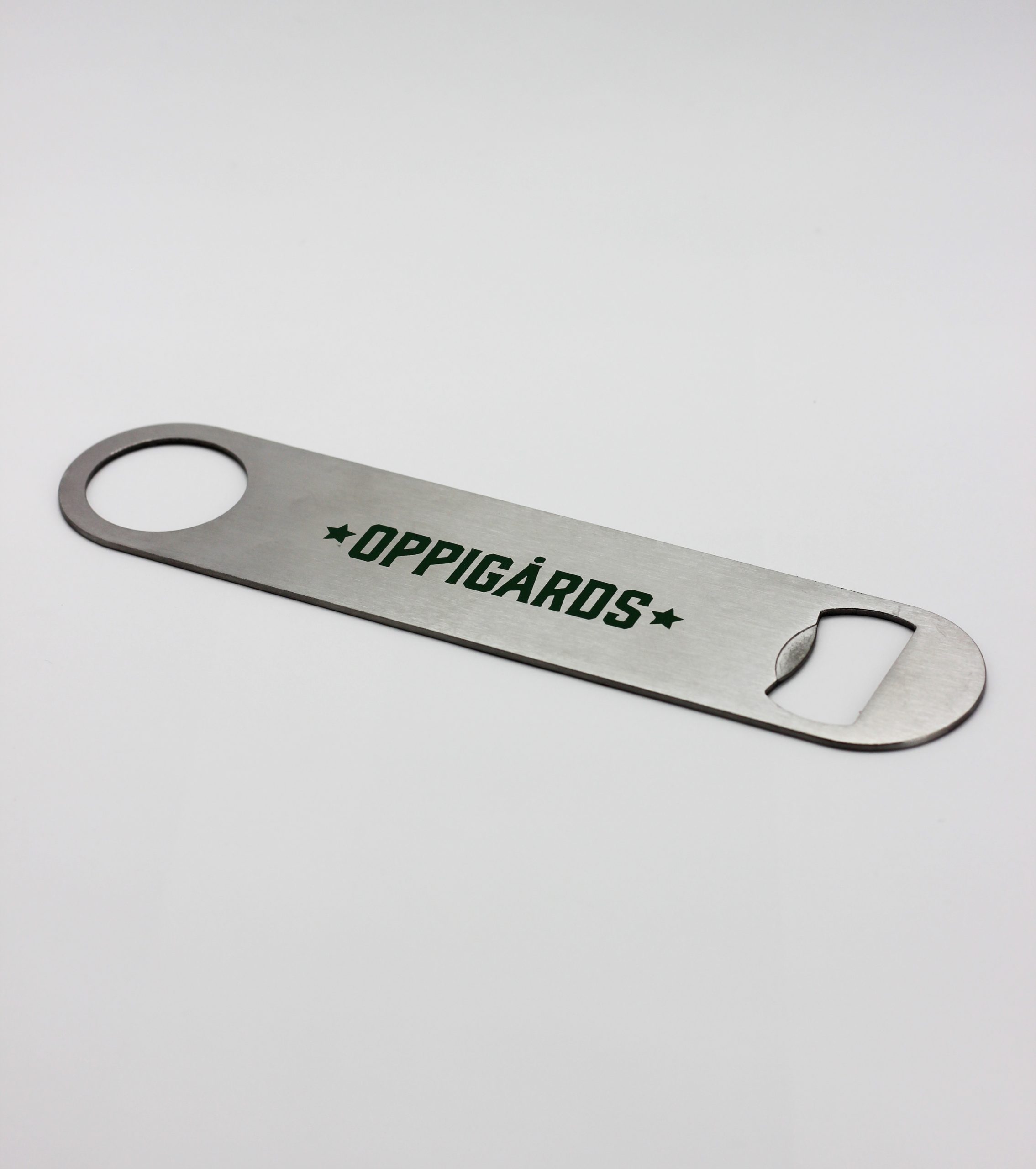 Ölöppnare med Oppigårds logga